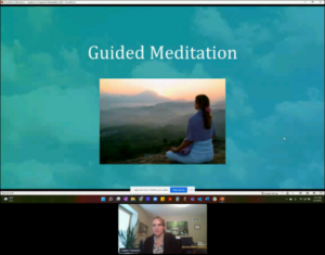 Claire Parsons leads a guided meditation at Legal Up 2022