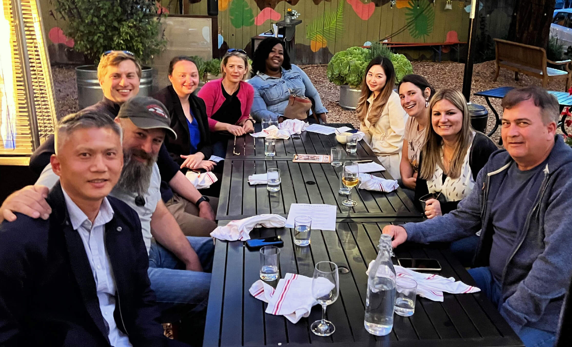 Team members enjoying food outside